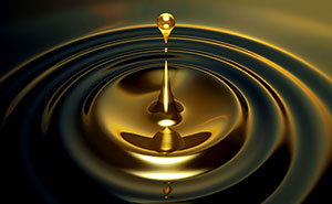 drop of oil causing a ripple